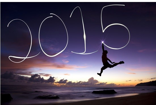 happy new year 2015.young man jumping and drawing 2015